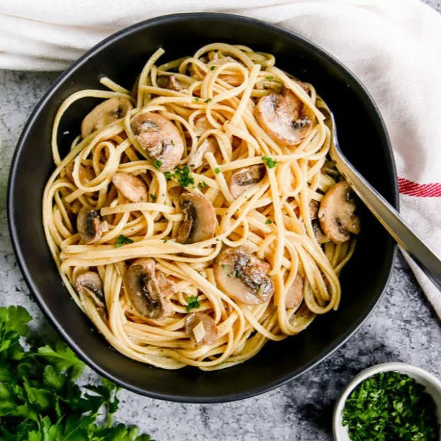 White wine mushroom pasta plated pexels owned image