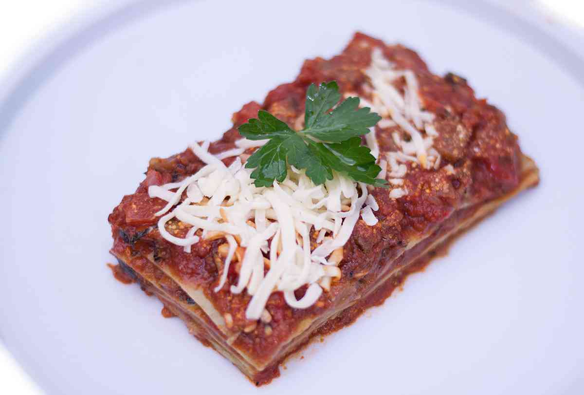 Mediterranean Roast Vegetable Lasagna made fresh on a plate with cheese on top